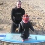 surfer dad and daughter