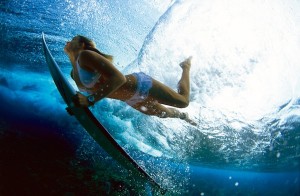 Underwater surfer girl