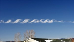 wave cloud clear skies
