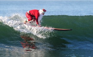 Santa surfing USA