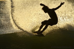 Surfing sunset silhouette