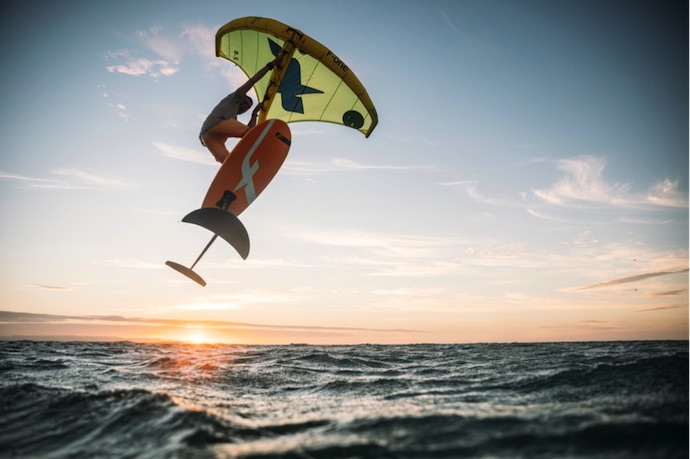 A surfer with a surf wing